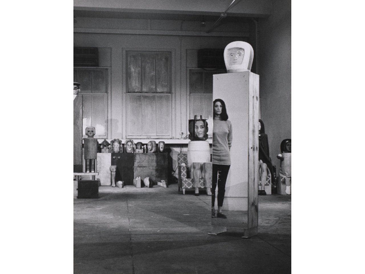 Marisol with several of her sculptures, 1964. Nancy Astor